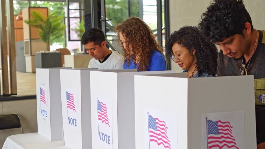 US election, diverse group of people casting their votes at a voting station in America, concept of democratic choice - Powered by Shutterstock - Get 15% off with code: PIKWIZARD15