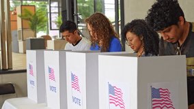 US election, diverse group of people casting their votes at a voting station in America, concept of democratic choice - Powered by Shutterstock - Get 15% off with code: PIKWIZARD15