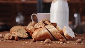 Breakfast in organic farm and countryside, milk bottle and fresh baked bread, multigrain cookies. Enjoy tasty and healthy food, traditional meal in old village, rotating wooden table in kitchen - Powered by Shutterstock - Get 15% off with code: PIKWIZARD15
