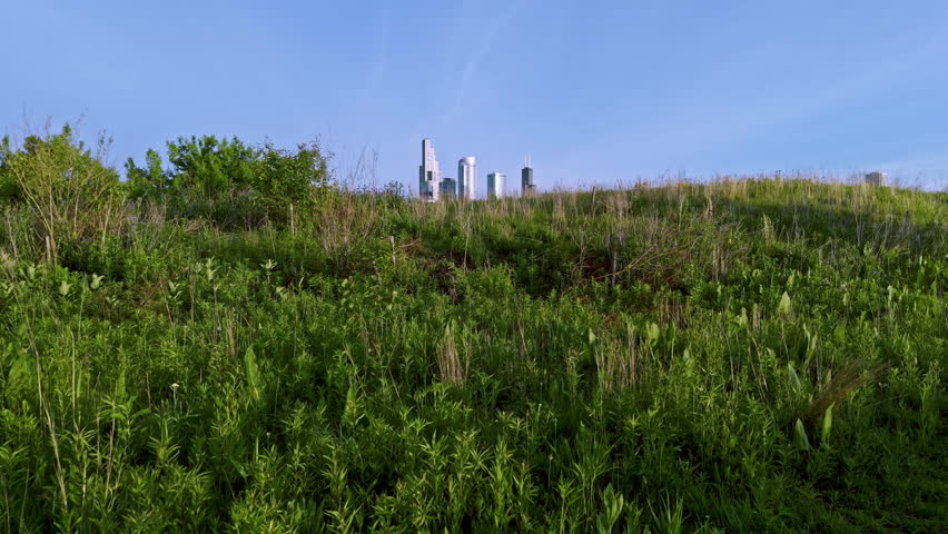 Aerial ascending shot from Northerly Island, revealing the Skyline of Chicago