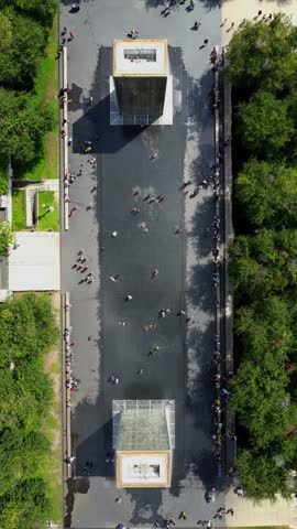 Overhead view time-lapse of Crown Fountain in Chicago, Illinois on a hot summer day with water splashing