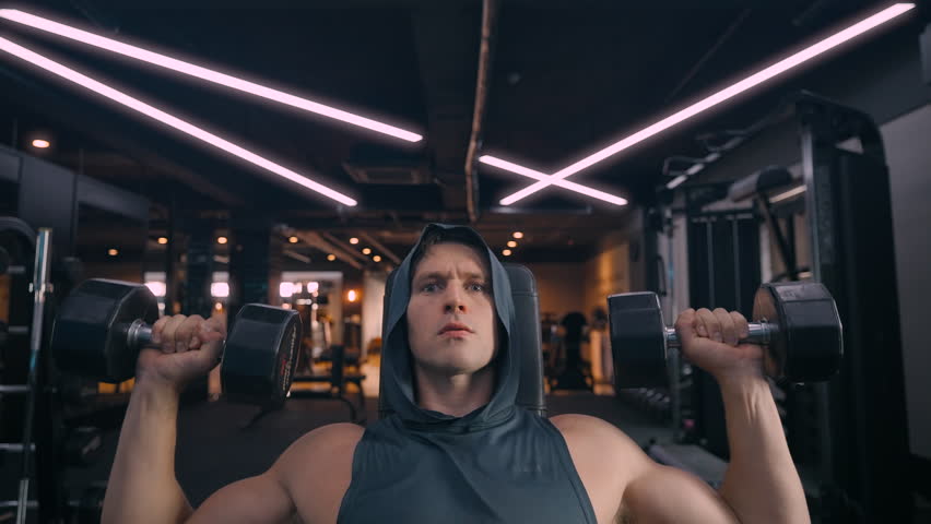 Healthy Male in 30s Performing Dumbbell Shoulder Press