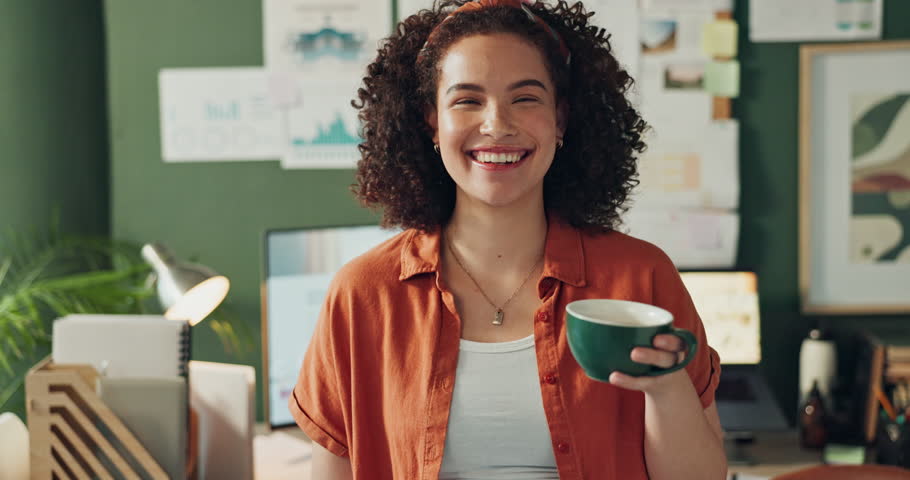 Smile, businesswoman and coffee in office, desk and relax for creative professional in workplace. Technology, planning and magazine art director, artwork and female person with tea or matcha drink