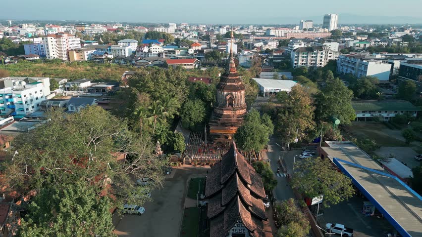 Wat Lok Moli - Buddhist Temple With Chedi And Viharn In Old City Of Chiang Mai, Thailand. aerial sideways shot