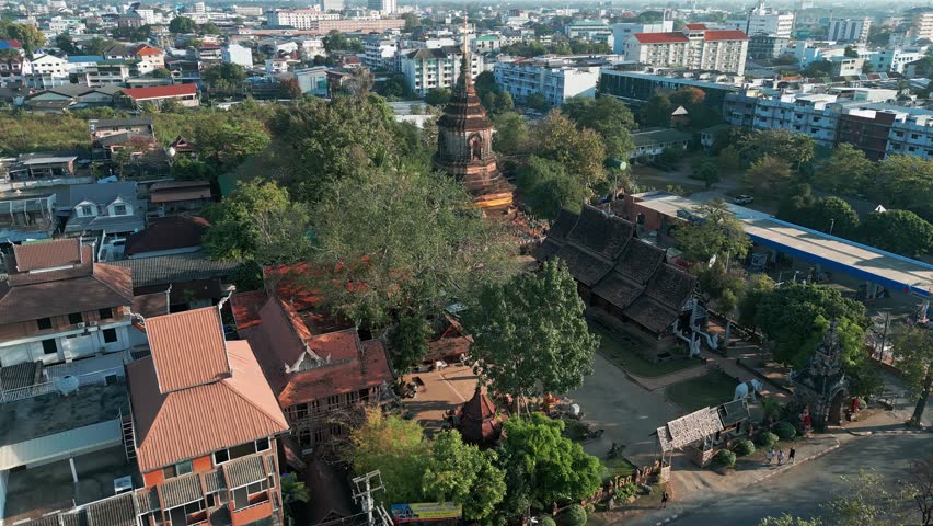 Chedi And Viharn Of Wat Lok Moli Buddhist Temple In Chiang Mai, Thailand. aerial shot
