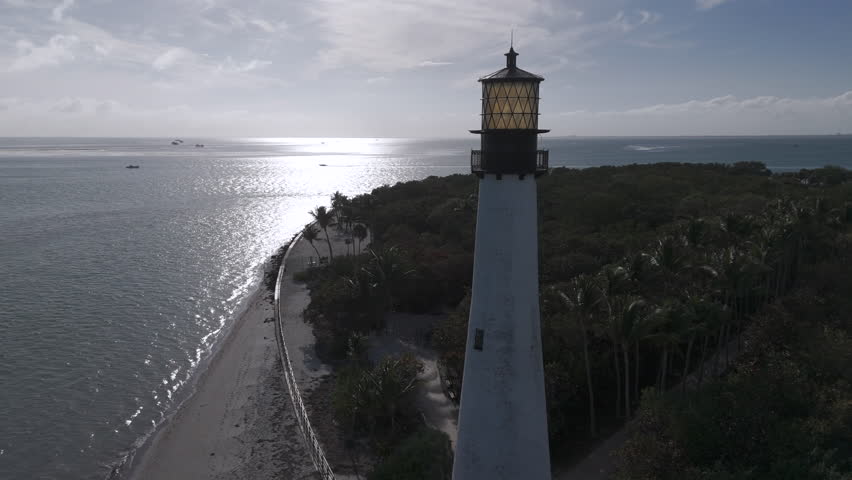 Cape Florida Lighthouse At Bill Baggs State Park During Sunrise In Key Biscayne, Florida USA. Aerial Drone Shot