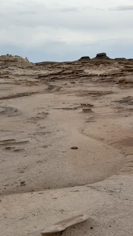 Hiking in Bisti Badlands near Farmington New Mexico, Bisti De Na Zin Wilderness, authentic natural landscape scenery, otherworldly, Mars surface, mysterious, Venus surface, extraterrestrial, untouched