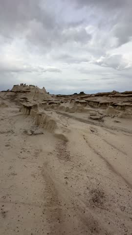 Hiking in Bisti Badlands near Farmington New Mexico, Bisti De Na Zin Wilderness, authentic natural landscape scenery, otherworldly, Mars surface, mysterious, Venus surface, extraterrestrial, untouched