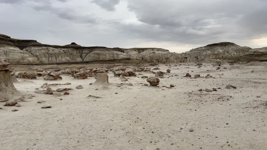 Hiking in Bisti Badlands near Farmington New Mexico, Bisti De Na Zin Wilderness, authentic natural landscape scenery, otherworldly, Mars surface, mysterious, Venus surface, extraterrestrial, untouched