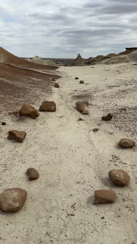 Hiking in Bisti Badlands near Farmington New Mexico, Bisti De Na Zin Wilderness, authentic natural landscape scenery, otherworldly, Mars surface, mysterious, Venus surface, extraterrestrial, untouched