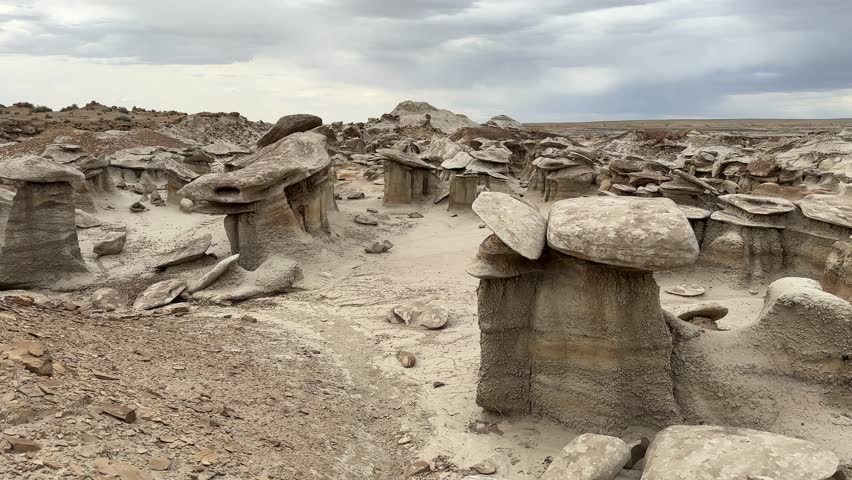 Hiking in Bisti Badlands near Farmington New Mexico, Bisti De Na Zin Wilderness, authentic natural landscape scenery, otherworldly, Mars surface, mysterious, Venus surface, extraterrestrial, untouched