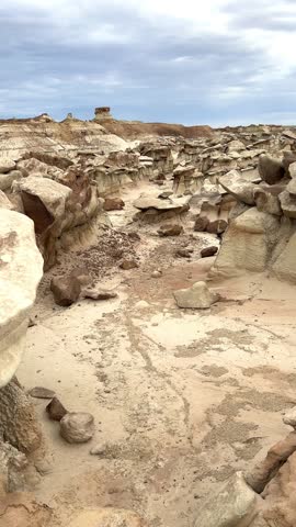 Hiking in Bisti Badlands near Farmington New Mexico, Bisti De Na Zin Wilderness, authentic natural landscape scenery, otherworldly, Mars surface, mysterious, Venus surface, extraterrestrial, untouched