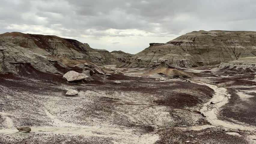 Hiking in Bisti Badlands near Farmington New Mexico, Bisti De Na Zin Wilderness, authentic natural landscape scenery, otherworldly, Mars surface, mysterious, Venus surface, extraterrestrial, untouched