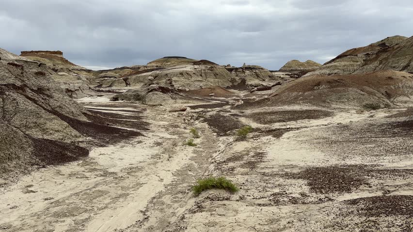 Hiking in Bisti Badlands near Farmington New Mexico, Bisti De Na Zin Wilderness, authentic natural landscape scenery, otherworldly, Mars surface, mysterious, Venus surface, extraterrestrial, untouched
