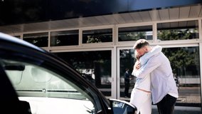 Excited Husband and Wife Choosing Their New Red Car at Auto Dealership, Happy Customers Making a Big Purchase. - Powered by Shutterstock - Get 15% off with code: PIKWIZARD15
