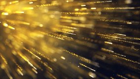 An animation of as shimmering gold streaks radiating with bright light against a dark setting. - Powered by Shutterstock - Get 15% off with code: PIKWIZARD15