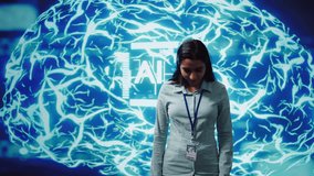 Jolly engineer using artificial intelligence computing simulating human brain thought processes. Portrait of upbeat Indian employee working with AI machine learning algorithms, camera B - Powered by Shutterstock - Get 15% off with code: PIKWIZARD15