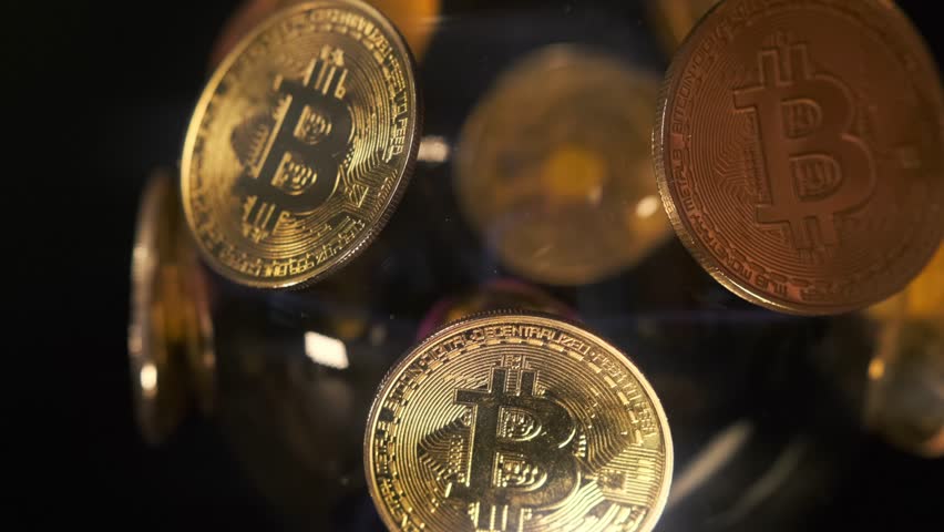 Close up, bitcoin gold coins ball slow spin on dark background, B-roll for e-commerce. Cryptocurrency Bit-coin BTC. - Powered by Shutterstock - Get 15% off with code: PIKWIZARD15