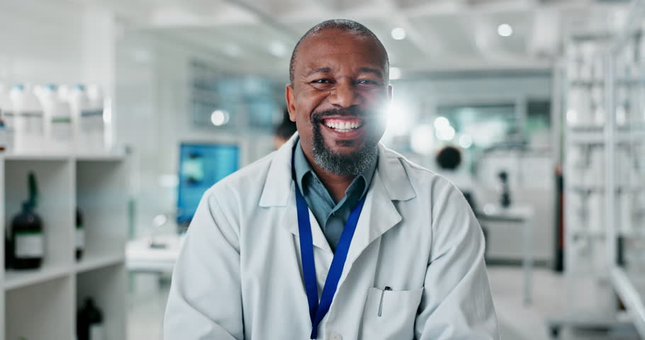 Portrait, happy man and scientist in lab for research, pharma or healthcare innovation. Face, science and smile of medical doctor, professional or biochemist laugh for medicine development with flare