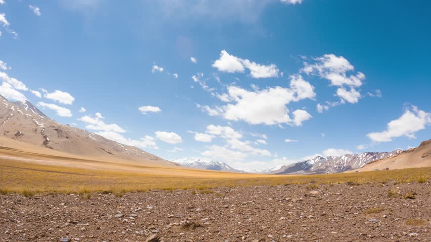 4K Time lapse of clouds on mountains at More Plains, Ladakh, India. Scenic Ladakh mountains and moving clouds in sky. Summer holidays and travel concept.