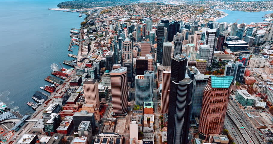 Scenic view of Seattle downtown from aerial perspective. Gorgeous high-rise buildings grouped in the business center of the metropolis.