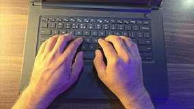 A boy typing on black Laptop, only just Hand and laptop keyboard, Black Laptop, keyboard - Powered by Shutterstock - Get 15% off with code: PIKWIZARD15