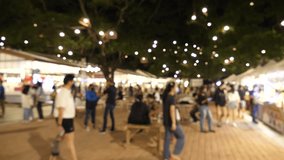 Slow motion of blurred busy busy fresh market full with crowd people walking in street shopping.
Thailand street food night market booth festival light bright bokeh. - Powered by Shutterstock - Get 15% off with code: PIKWIZARD15