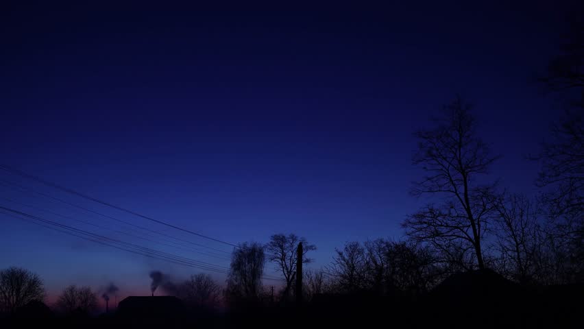 A beautiful cinematic time-lapse shot of the red sky before sunrise