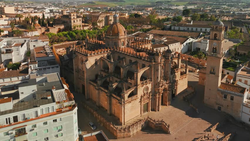 Aerial view of Jerez de la Frontera town in Andalusia, Spain. Jerez Cathedral and historic Moorish Alcazar de Jerez de la Frontera at sunset in Andalucia