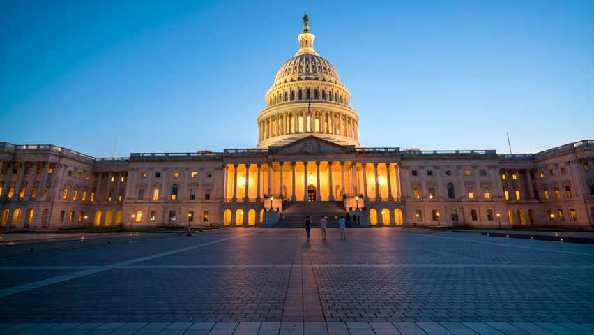 Time Lapse US Capitol Illuminated at Dusk with no Clouds in the sky
