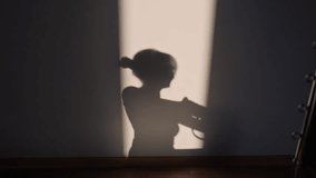 Woman doing pilates exercise on Pilates Reformer for the chest and back muscles, focusing on flexibility, strength, and control with determination - Powered by Shutterstock - Get 15% off with code: PIKWIZARD15