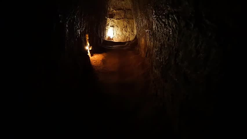 Indoor Cu Chi tunnel, historic underground dugout of Vietnamese war, famous destination sites for Ho Chi Minh city travel, Vietnam, places that Vietcong living with camouflage in warfare