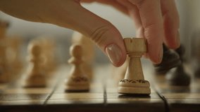 Hand Moving Chess Piece on Board - Powered by Shutterstock - Get 15% off with code: PIKWIZARD15