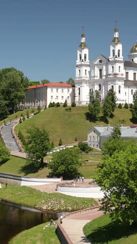 Vitebsk, Belarus. Assumption Cathedral Church In Upper Town On Uspensky Mount Hill And Dvina River In Summer Evening Sunset Time. Zoom, Zoom Out.