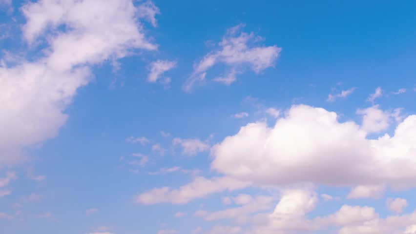 White rolling natural clouds in summer sunny hot day with blue skies, fluffy cloudscape in horizone.