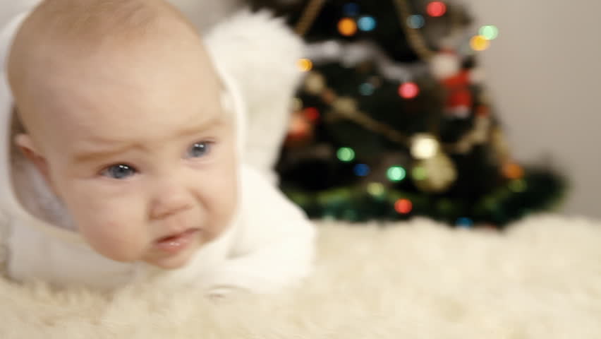 Baby in white on the Christmas  and new year background
