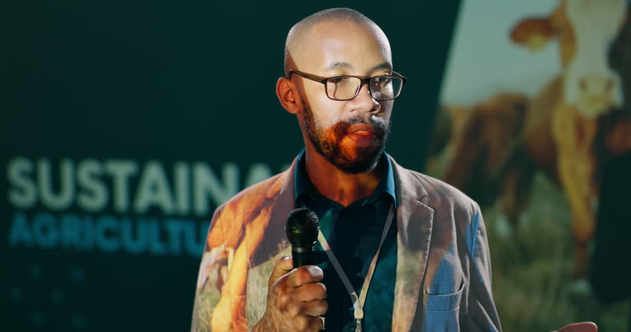 Presentation, conference and businessman with mic at event for sustainability workshop for farm training. Seminar, talk and male agro speaker on podium at agriculture convention for harvest speecg.