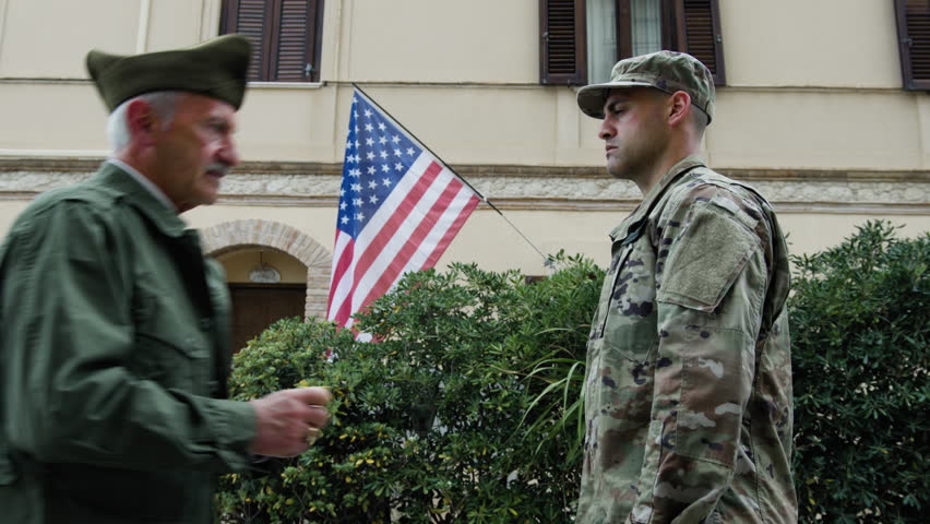 General Instills Valor In American Serviceman With Flag For His Service
