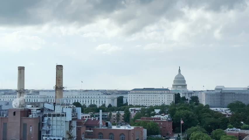 An aerial view of Washington, DC from a rooftop hotel in Summer with the United Capitol in the background 4k
