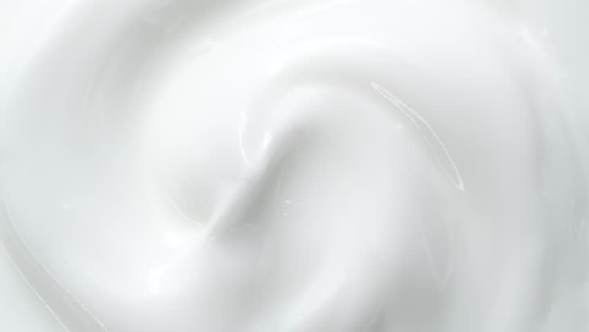 Macro white smooth eye, skin cream texture, closeup beauty facial cosmetics mask