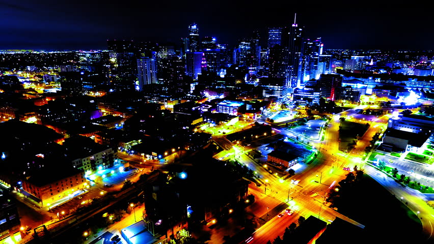 Aerial Lockdown Time Lapse Shot Of Illuminated Residential Cityscape Against Clear Sky At Night - Denver, Colorado