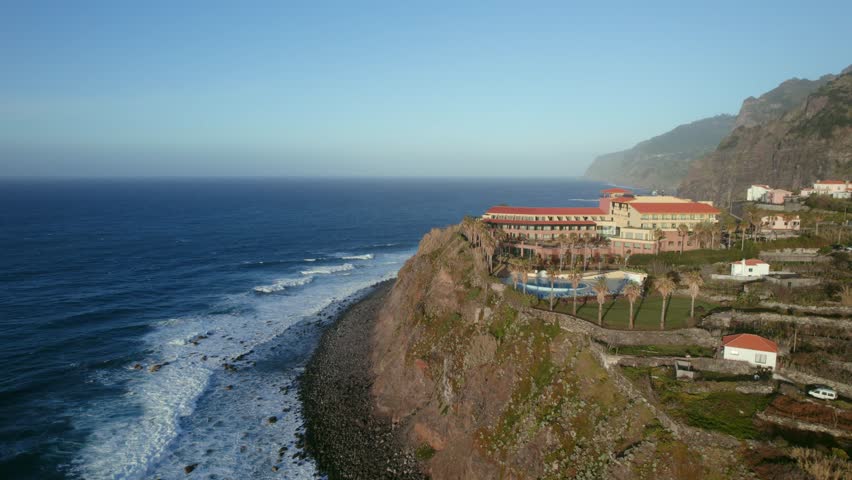 Drone view of the hotel located on the cliff on the shore of the Atlantic ocean