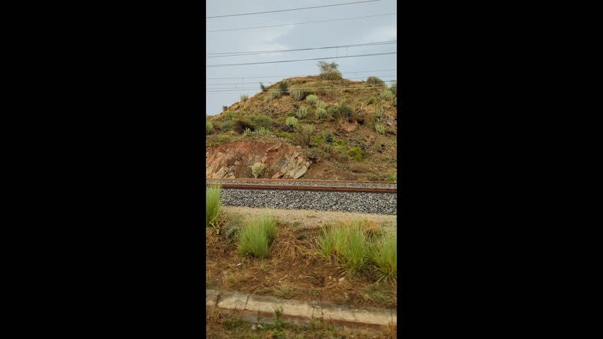 View of beautiful mountains from running train