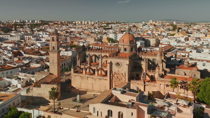 Aerial view of Jerez de la Frontera town in Andalusia, Spain. Jerez Cathedral and historic Moorish Alcazar de Jerez de la Frontera at sunset in Andalucia