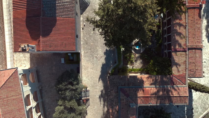 Aerial view of Neophytos Monastery in Cyprus. Architecture of a religious tourist town in the mountains. High quality 4k footage