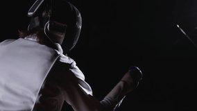 Fight Of Two Professional Fencers In Darkness, Slow Motion, Men With Epee Or Sabers Fencing - Powered by Shutterstock - Get 15% off with code: PIKWIZARD15