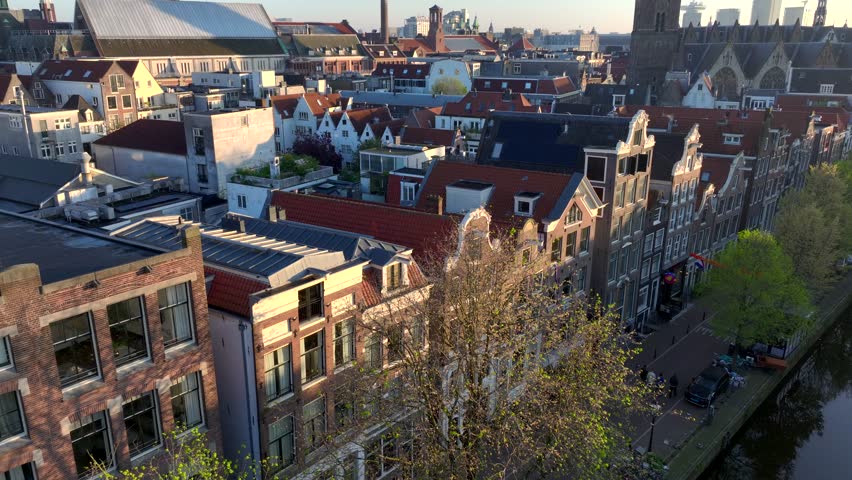 Amsterdam Historical Center Aerial morning View. Dam Street in Amsterdam, the Netherlands. Calm Dawn City, Centraal.