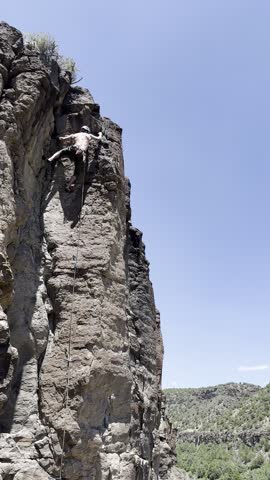 Climber on Top-Rope on Slab of Rock 