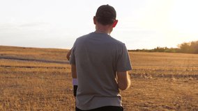 Happy family playing ball: boy and father play american football. boy rugby ball passes dad in an outdoor activity. Experience the joy of family fun and teamwork - Powered by Shutterstock - Get 15% off with code: PIKWIZARD15