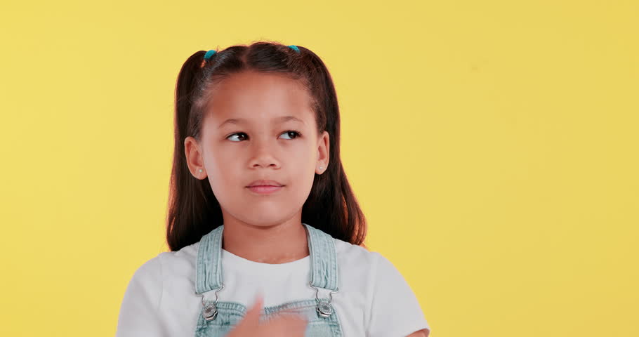 Girl, question and thinking or idea on studio background with confused face for education or learning. Student or kid with doubt, trying to remember or process information for memory, ADHD or why